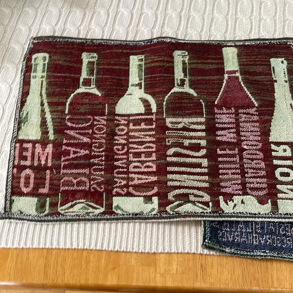 NWT wine themed placemats 2 in lot different styles. Tapestry grapes bottles cab